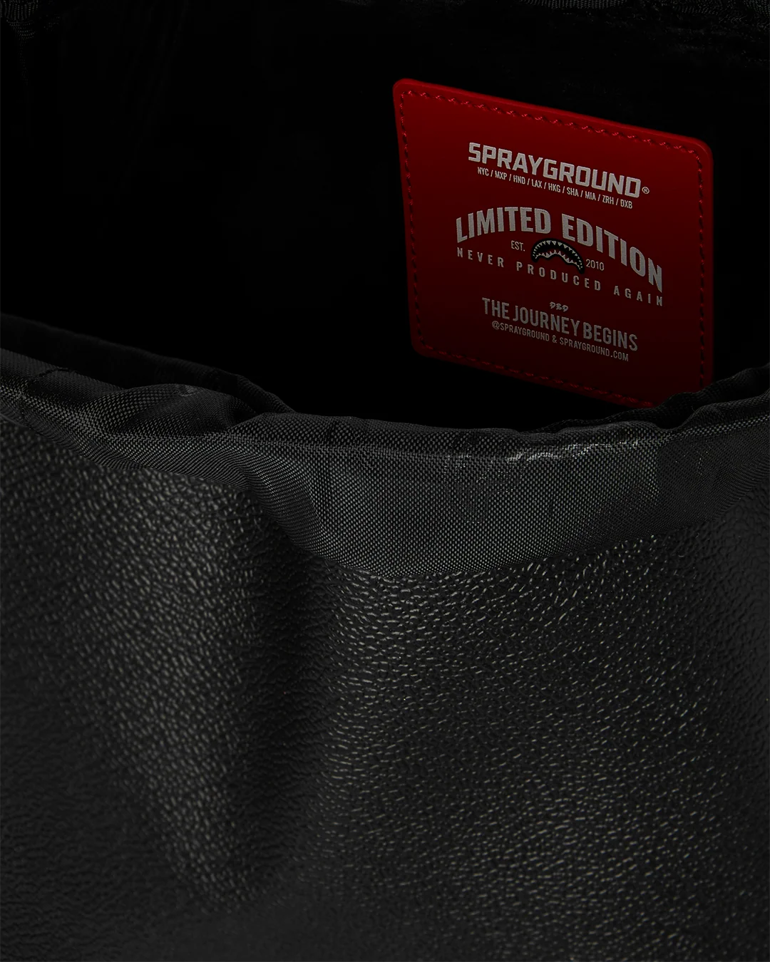 Sprayground- Gold Brick Drip Hills Backpack